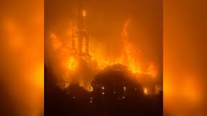 Suspect arrested for arson in burning of historic Catholic church in New Brunswick, Canada